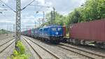 BR 140 649-5 EGP mit Container bei der Durchfahrt HH-Harburg.