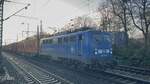 BR 140 851-7 (PRESS 140 038-0) mit Containern bei der Durchfahrt HH-Harburg.