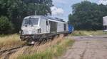 BR 248 009-3 (PCW 10) von Siemens Mobility mit Schotterzug bei der Ausfahrt Glinde -> HH-Tiefstack.