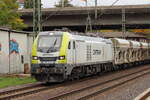 BR 159 104-9 D-ITL von Captrain mit Schotterwagen bei der durchfahrt HH-Harburg Richtung Maschen.
