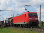 BR 185 185-6 mit Mischer durch Dedesen-Gmmer Richtung Seelze. 17.Mai 2025