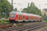 BR 245 004 schiebt ihren (RB 40 / RB 27044 Mühldorf(Oberbay) -> München Hbf) mit dem Dosto-Steuerwagen ( Bargteheide ) durch M-Heimeranplatz.